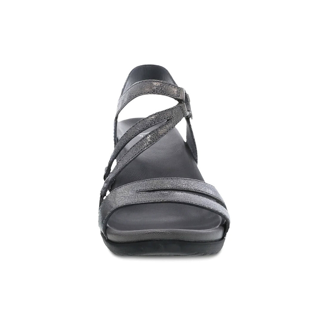 Front view of the DANSKO ADDYSON PEWTER METALLIC DISTRESSED wedge sandal by Dansko, featuring black, strappy cross-over straps, a low heel, and a contoured EVA footbed.