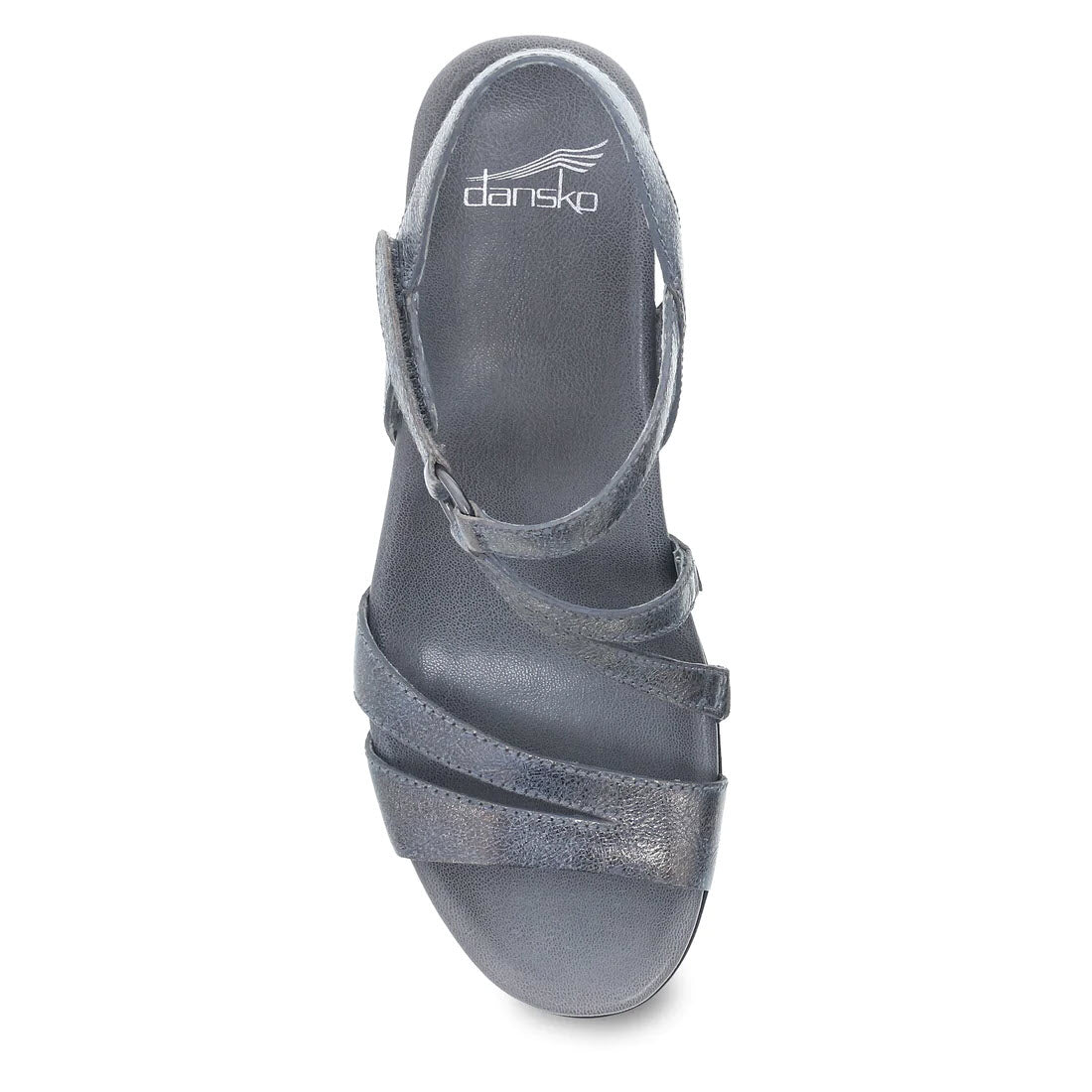 Top view of the Dansko Addyson Pewter Metallic Distressed wedge sandal for women, featuring three front straps, an adjustable ankle strap, and a contoured EVA footbed.