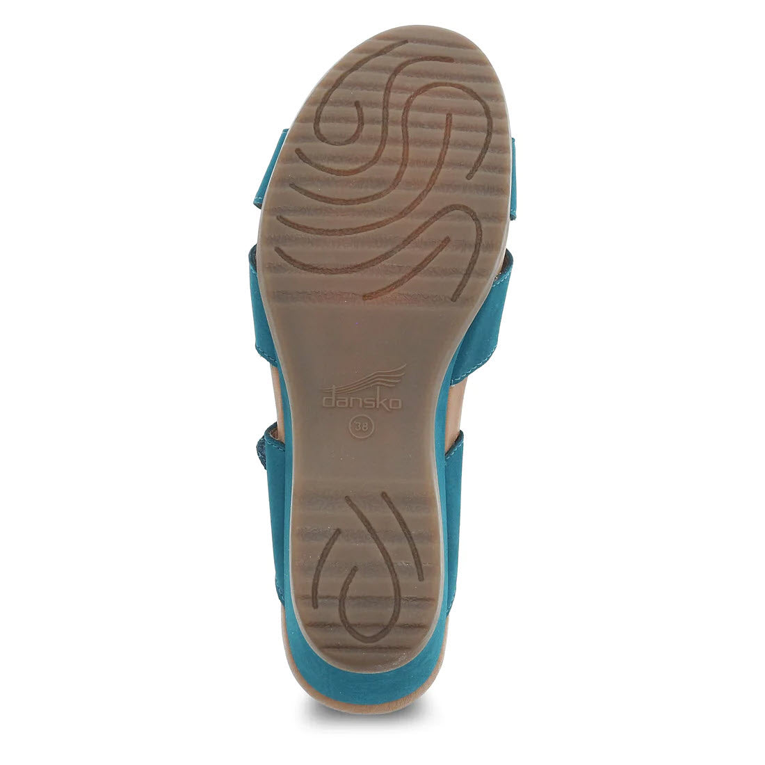 The image shows the bottom view of the Dansko Aubree Teal Nubuck women&#39;s open back wedge sandal, featuring a turquoise strap and a patterned tread on the sole.