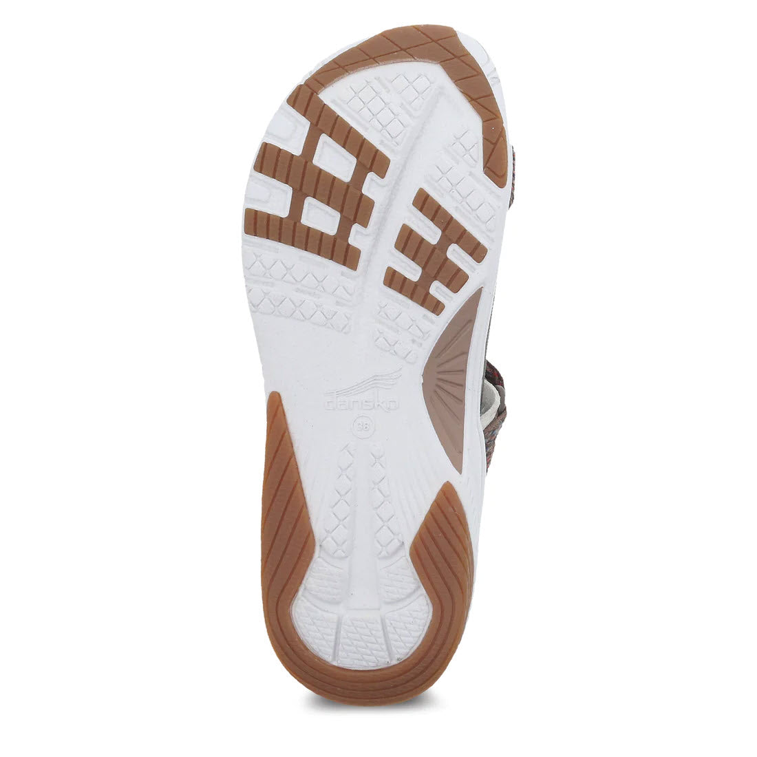 View of the bottom sole of the DANSKO ROSETTE BROWN MULTI - WOMENS shoe by Dansko, showcasing a white rubber surface with brown accents and diverse tread patterns designed for legendary comfort and support.