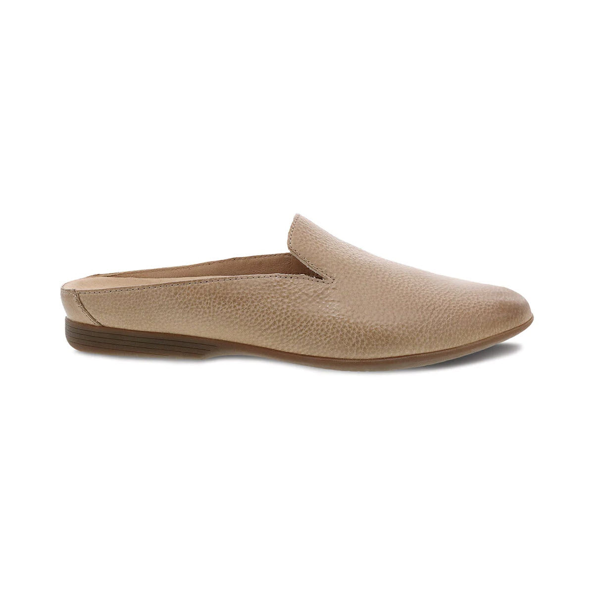 Discover the Dansko Lexie Taupe, a tan slip-on leather mule with a flat heel and textured surface from Dansko. This everyday flat also features a cushioned footbed for maximum comfort.