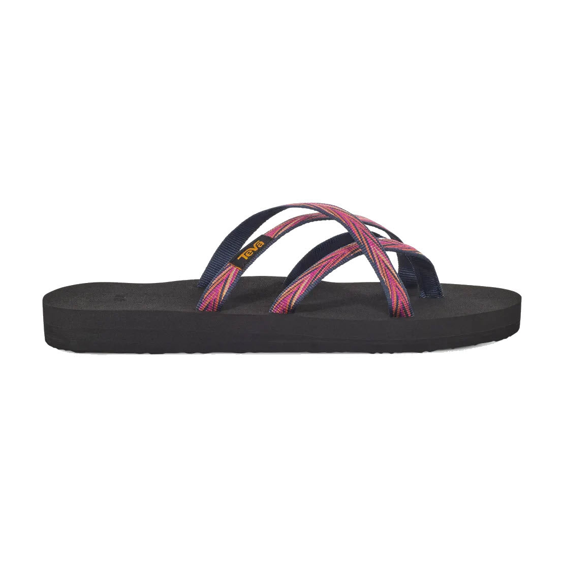 Side view of the TEVA OLOWAHU INDIGO/ROSE VIOLET women&#39;s slip-on sandal with black multi-colored crisscross straps made from quick-dry webbing by Teva.