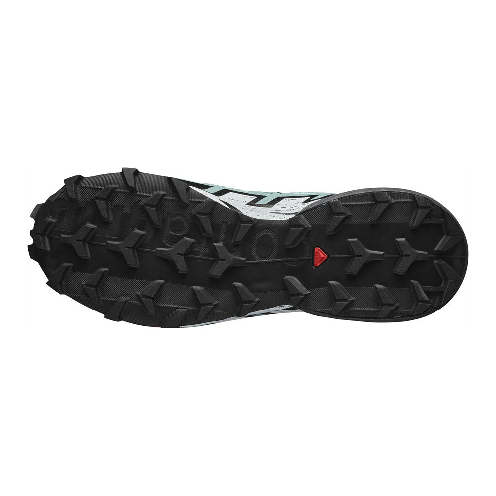 Underside view of a Salomon SOLOMON SPEEDCROSS 6 GTX BLACK - WOMENS trail running shoe featuring a black rubber sole with prominent lugs for enhanced grip on rough terrain, designed with Gore-Tex for waterproof protection.