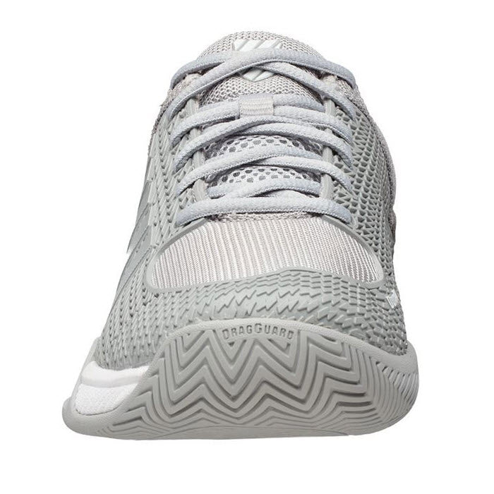 A close-up front view of the K-Swiss Express Light Pickleball Highrise Gray for women, showcasing a grey athletic, lightweight breathable shoe with a mesh design, detailed textures, and a durable outsole featuring a zig-zag patterned sole.