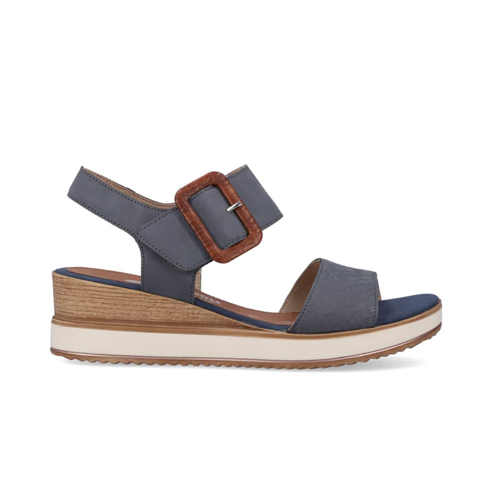 Introducing the Remonte Big Buckle Woven Sandal in Jeans - Womens: a comfortable denim blue wedge sandal featuring a wooden buckle, an adjustable ankle strap, and a tan sole with white edges, all atop a platform heel.