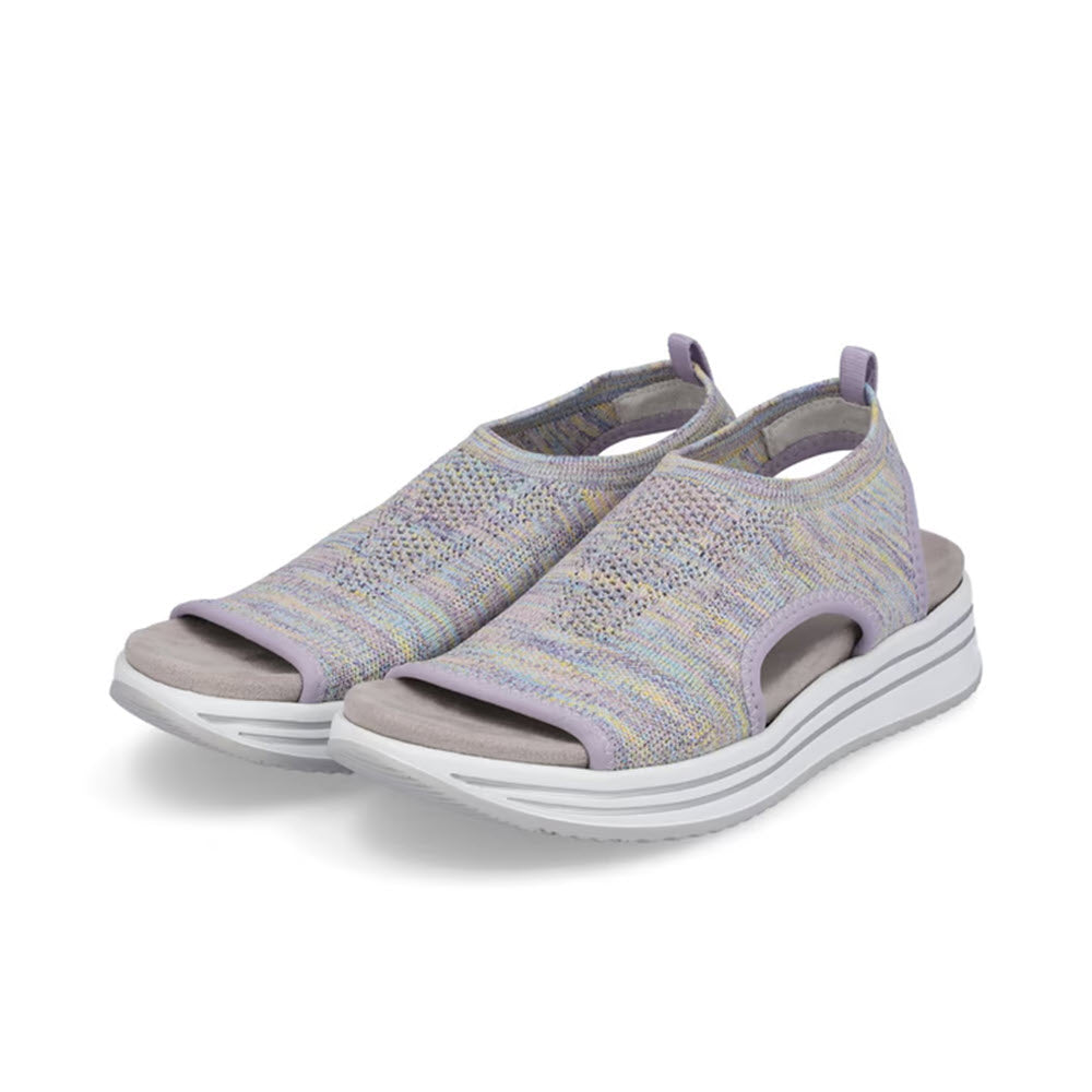 The REMONTE ATHLEISURE KNIT SANDAL LILAC MULTI for women by Remonte features an expert design of open-toe platform sandals with patterned fabric uppers in soft pastel shades, including supportive white, thick wedge rubber soles and orthotic-friendly elements.