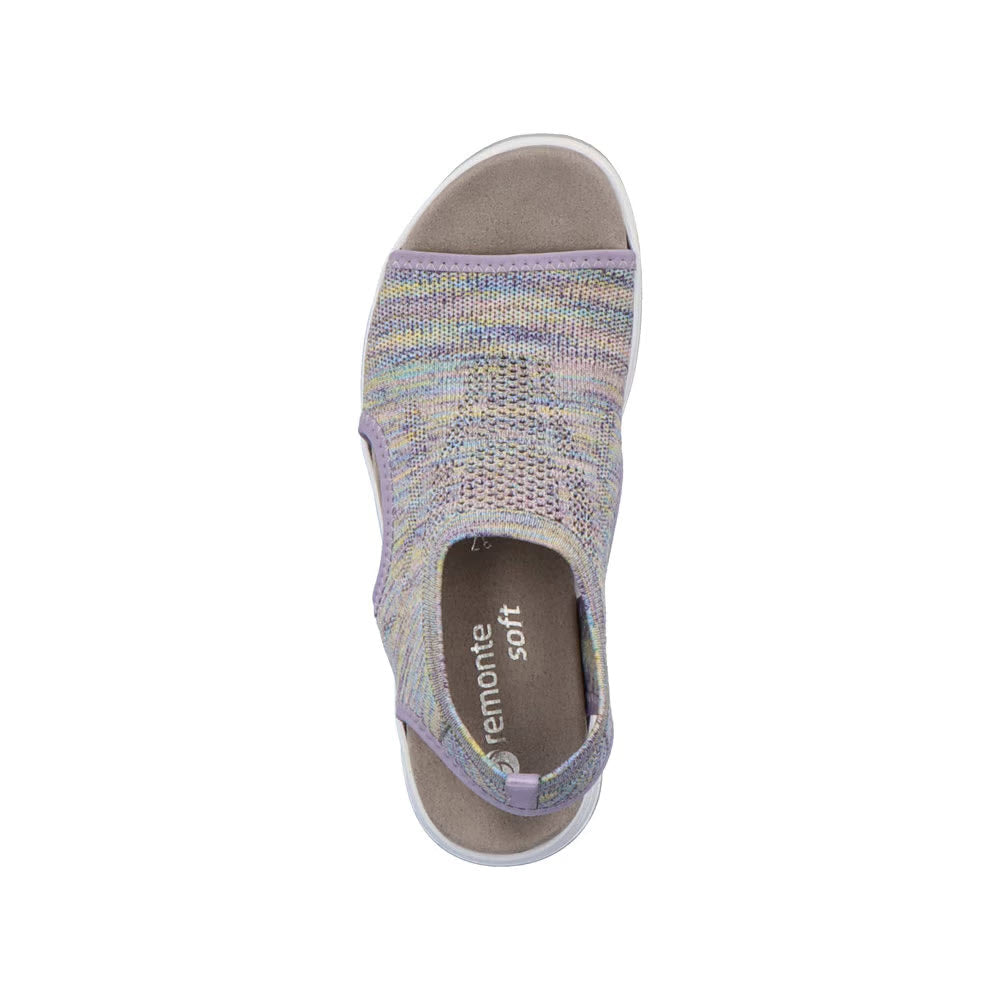 Top view of the REMONTE ATHLEISURE KNIT SANDAL LILAC MULTI - WOMENS, a vibrant multicolored knit platform sandal with an open toe, featuring &#39;Remonte Soft&#39; labeled on the insole and designed to be orthotic-friendly.