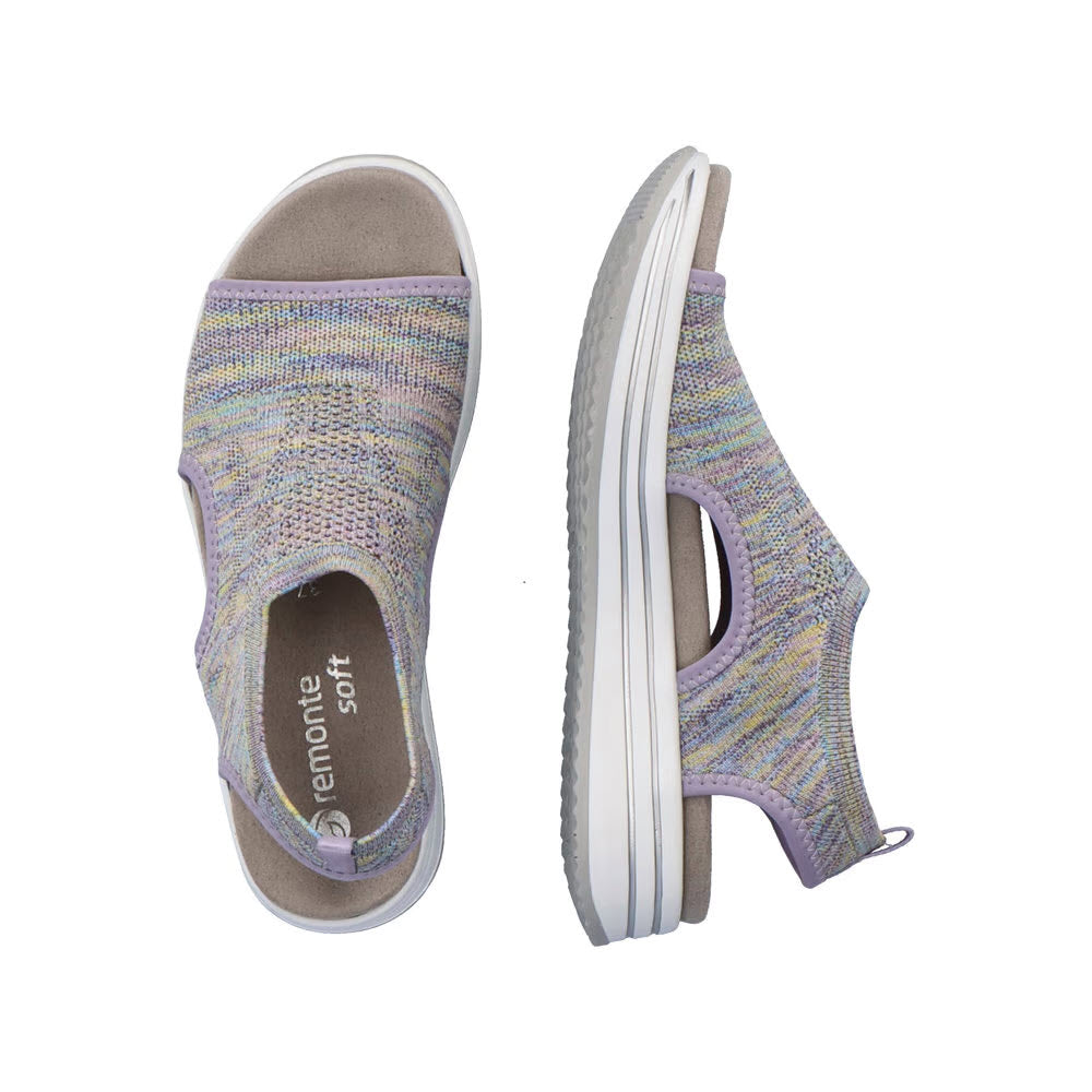 A pair of lilac multi open-toe, slip-on platform sandals with a textured fabric upper and white cushioned soles. Brand name &quot;Remonte&quot; is visible inside one shoe, and the product name is REMONTE ATHLEISURE KNIT SANDAL LILAC MULTI - WOMENS.