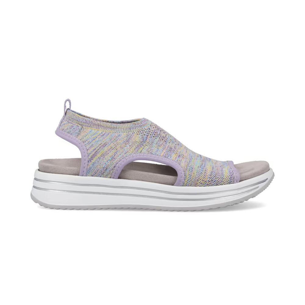 Side view of the REMONTE ATHLEISURE KNIT SANDAL LILAC MULTI for women by Remonte, showcasing a single casual, orthotic-friendly platform sandal with a multicolored fabric upper, open toes and heel, and a thick white rubber sole highlighted with gray accents.