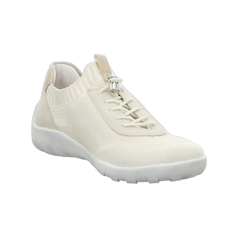 A vanilla-colored sneaker from Remonte, named the REMONTE LITE &amp; SOFT SNEAKER VANILLA - WOMENS, features a knitted upper, adjustable bungee laces, and a white rubber sole.