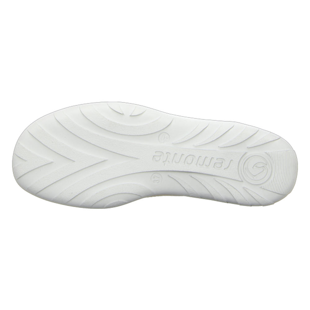 The image showcases the sole of the Remonte Lite &amp; Soft Sneaker Vanilla—Women&#39;s by Remonte, highlighting a tread pattern with grooves and the word &quot;Memory&quot; imprinted at the center. This sneaker also features adjustable bungee laces for a snug fit and a cushioned removable footbed for enhanced comfort.