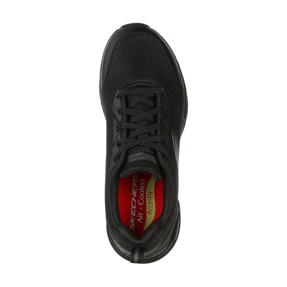 Top view of a black Skechers SKECHERS ARCH FIT SLIP RESISTANT OXFORD BLACK - WOMENS sneaker with laces and a red cushioned insole, featuring the &quot;Air Cooled Memory Foam&quot; and &quot;Arch Fit®&quot; label inside.