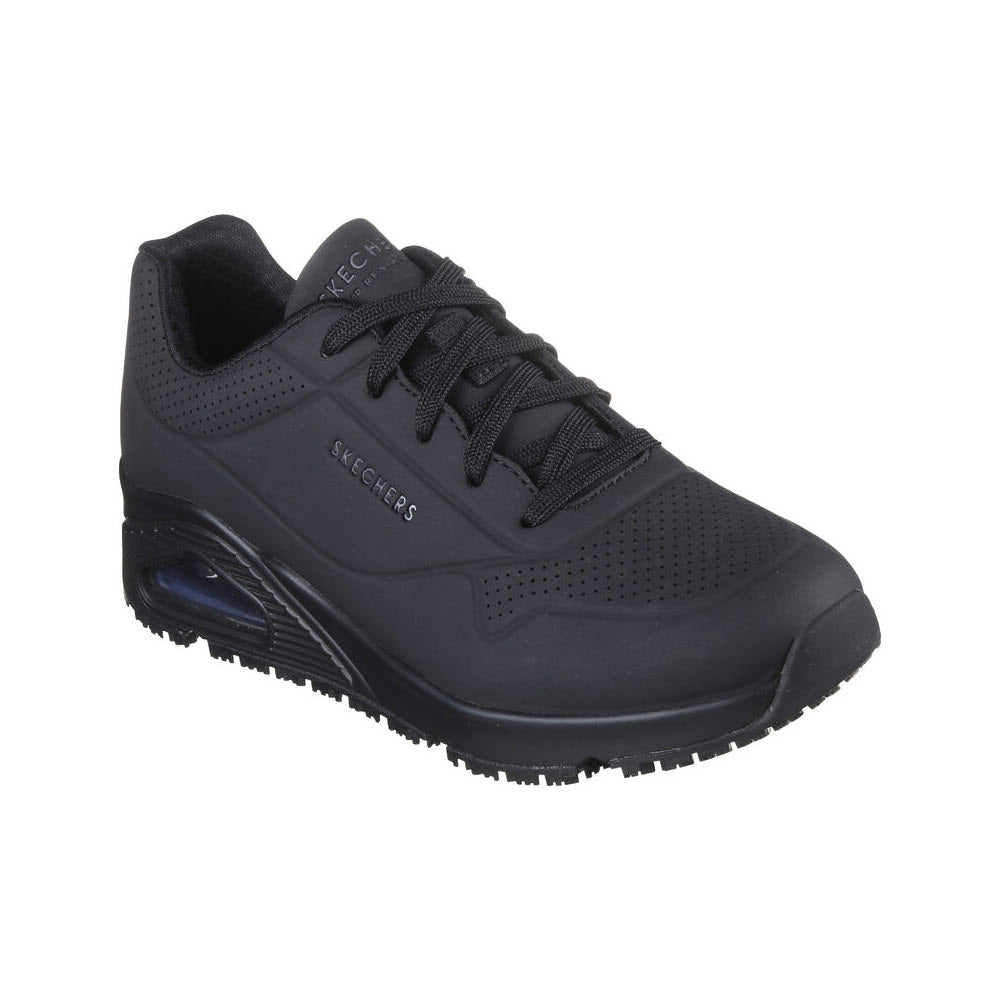 A black Skechers SKECHERS UNO SR DELONEY SAFETY TOE BLACK - WOMENS athletic shoe with perforated detailing, a lace-up design, and a thick sole featuring a visible air cushion. The slip-resistant outsole complements the comfort of memory foam insoles for all-day wear.