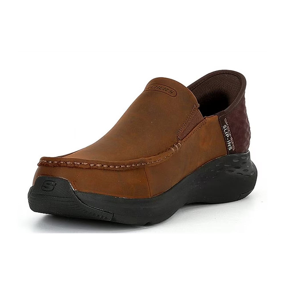 A single Skechers Oswin Moc Toe Leather Slip-In Dark Brown shoe with a black sole and Air-Cooled Memory Foam, featuring stitching details on a white background.