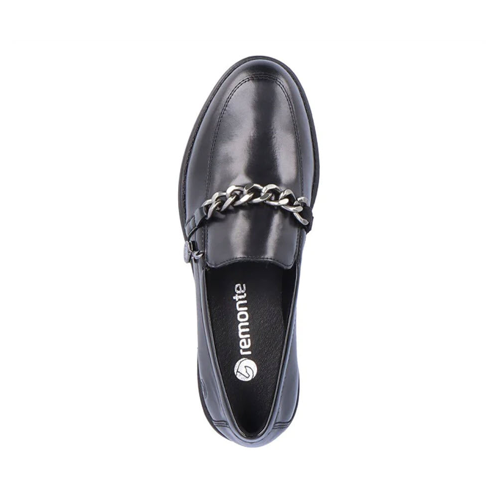 Top view of a REMONTE MODERN TAILORED LOAFER BLACK - WOMENS featuring a metallic chain across the top; Remonte branding is visible on the removable insole.