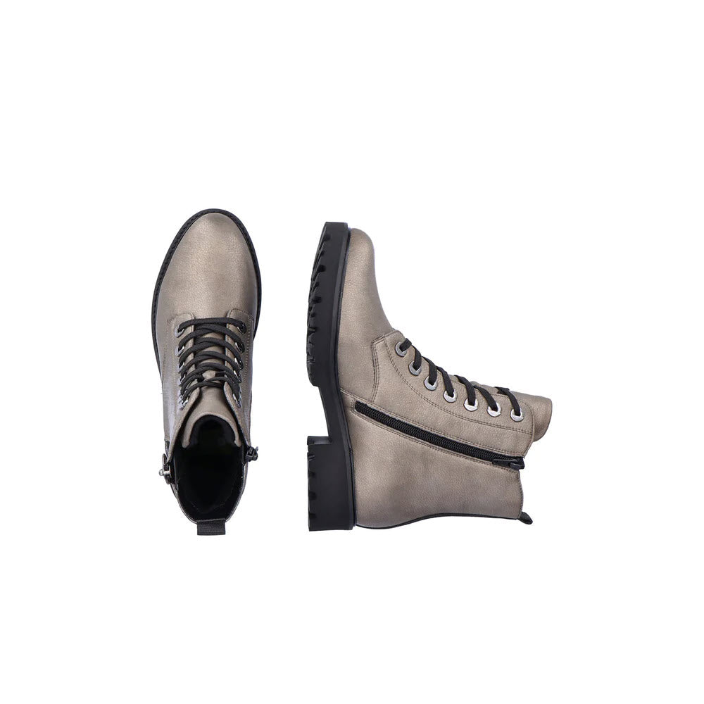 A pair of REMONTE TAILORED COMBAT BOOTIE SILVER METALLIC ankle boots by Remonte, featuring side zippers and a chunky cleated sole; one boot is upright, and the other is laying flat.