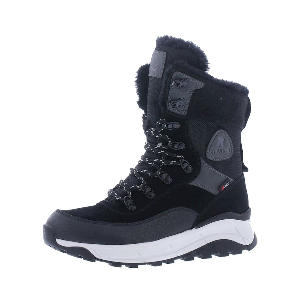 The Revolution Winter Boot Wool Cuff Black by Revolution is an insulated black and gray winter boot designed for cold weather, featuring a thick white sole, durable eyelets, and laces. Embrace the chill with these boots, complete with a wool lining for extra warmth.