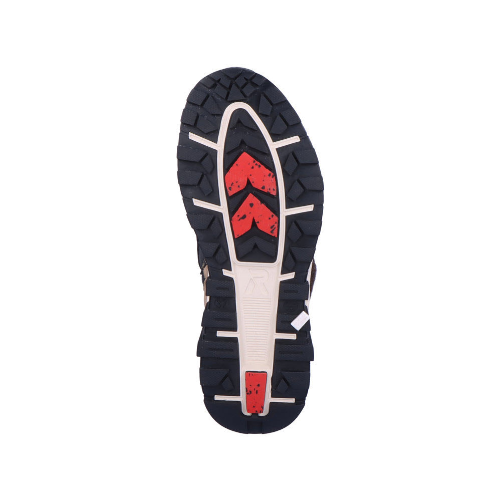 The image shows the sole of Revolution&#39;s Revolution Winter Boot Wool Cuff Black for women, featuring a black, red, and beige tread pattern designed for traction.