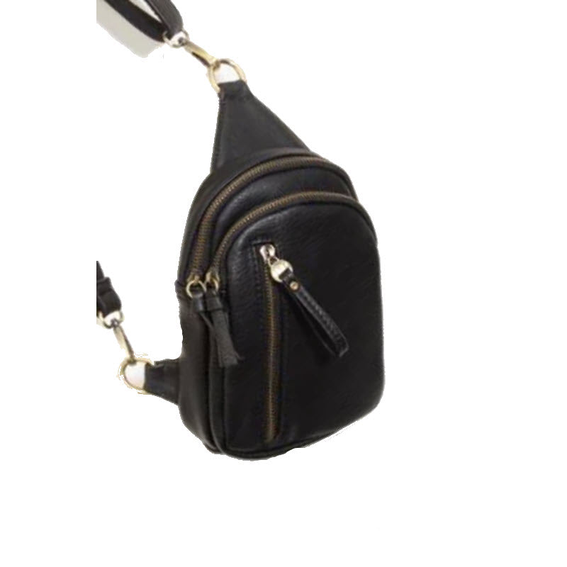 A small black vegan leather crossbody bag with a zippered front pocket and an adjustable, convertible strap from Joy Susan called the JOY SKYLAR SLING BLACK.