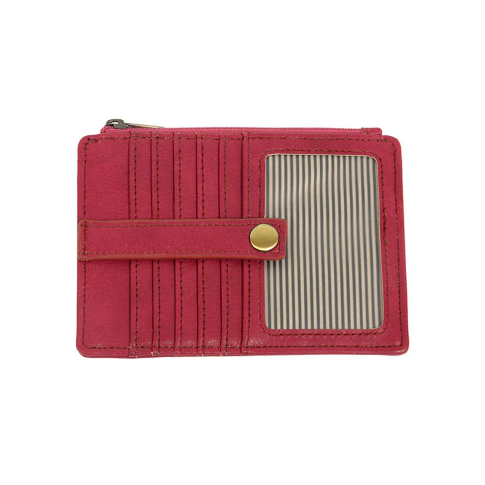 A slim, red vegan leather travel wallet featuring multiple card slots, a snap-button strap, and a transparent ID window: the JOY SUSAN NEW PENNY MINI WALLET CORAL by Joy Susan.