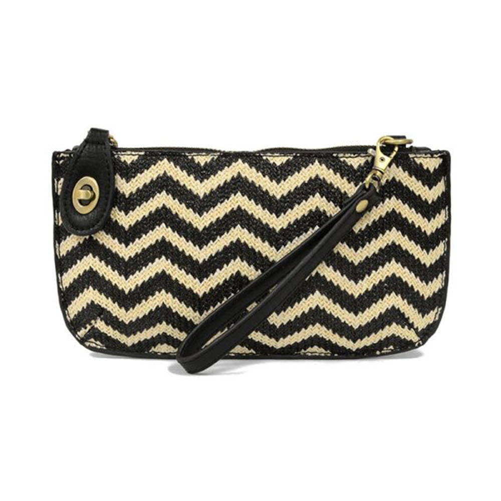 A Joy Susan JOY SUSAN STRAW MINI CROSSBODY WRISTLET BLACK/CREAM with a black and beige chevron pattern, black trim, a wrist strap, gold-tone snap button, and handy credit card pockets—perfect for those who love to travel light.