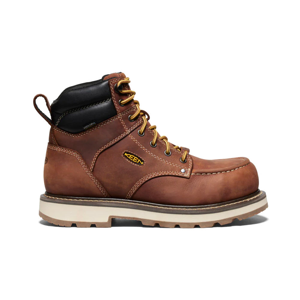 The KEEN CT Cincinnati 90 Degree 6 Inch Waterproof Tuscan Red Sandshell men's work boot features a rich brown leather exterior with striking yellow laces, a black padded collar for added comfort, and a durable thick beige sole. Adorned with a small yellow and black logo on the side, this boot is designed to offer both all-day wearability and lightweight comfort.