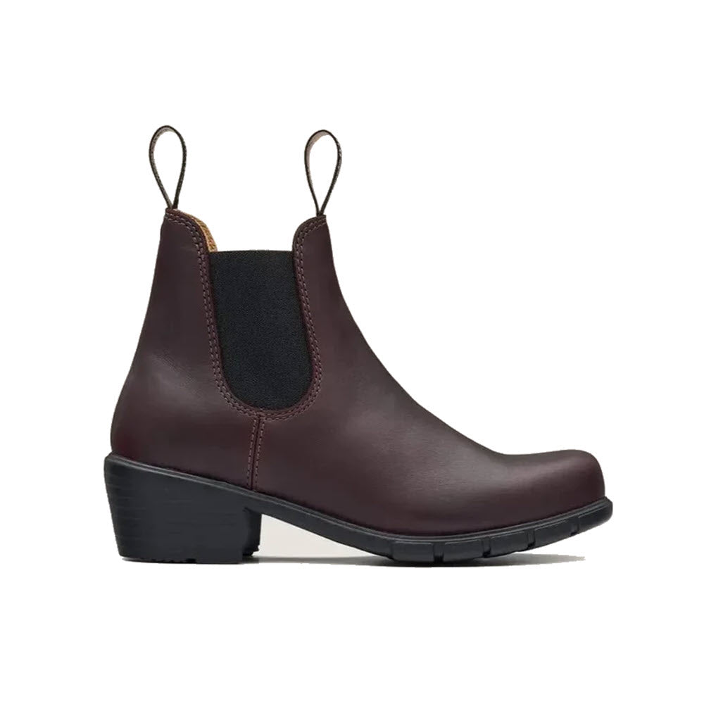 A dark brown BLUNDSTONE WOMENS HEEL SHIRAZ - WOMENS leather Chelsea boot with black elastic side panels, two pull tabs, a chunky heel, and a ridged rubber sole. These fashion-forward boots embody the timeless style and rugged durability signature to Blundstone.