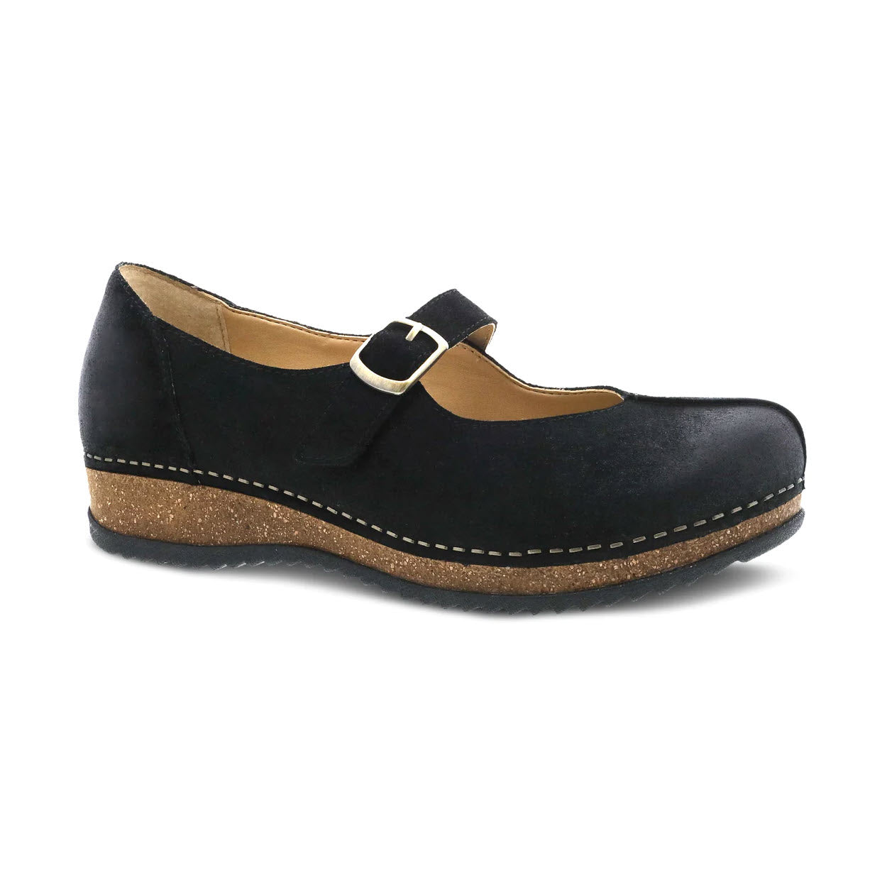 The Dansko Mika Black Burnished Suede women's shoe features a Mary Jane design with a sustainable cork wedge sole and a buckle strap. It showcases white stitching along the edges and is crafted from high-quality leathers, ensuring both style and durability.