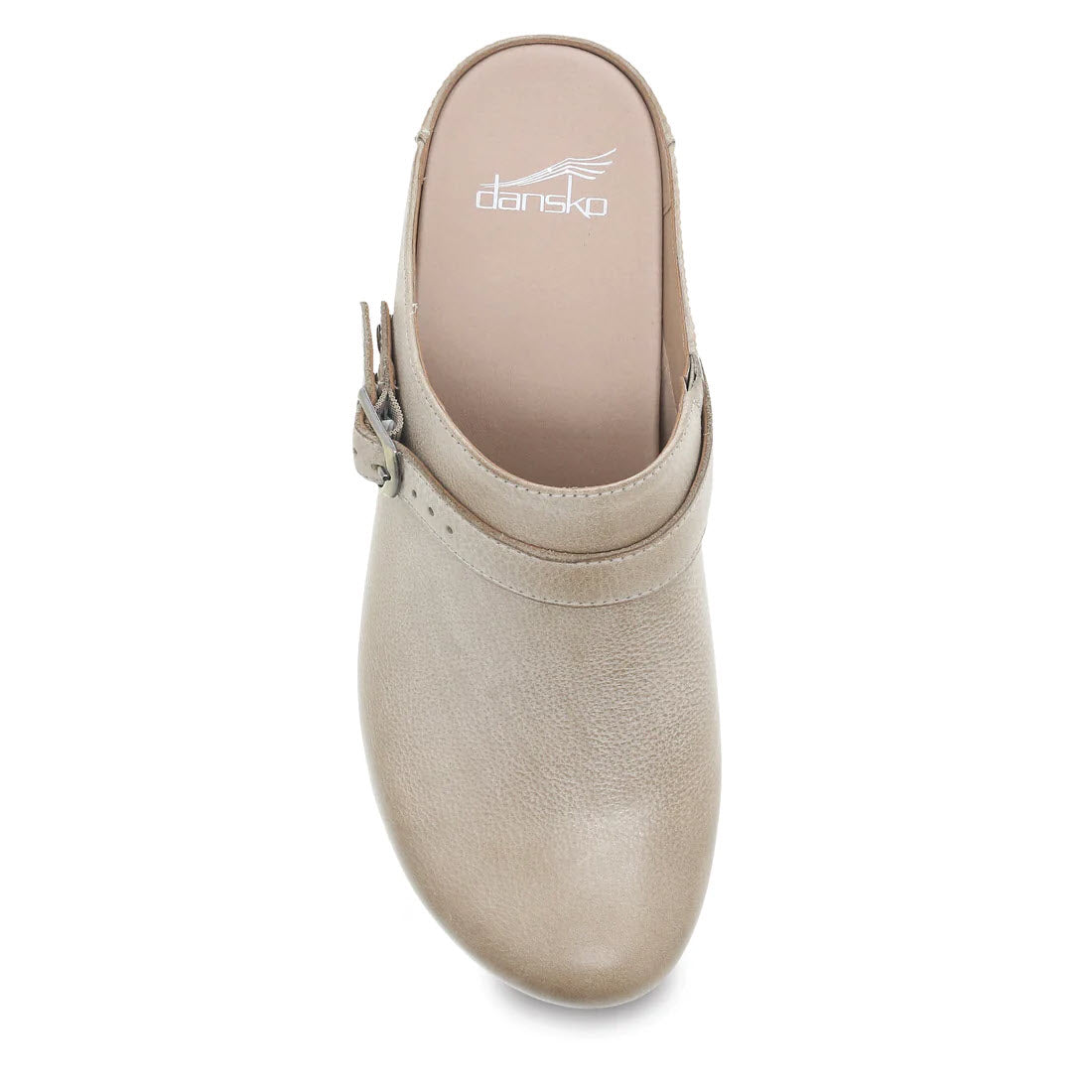 A top-view of a Dansko Berry Oyster Milled women&#39;s clog shoe in beige showcases a fun and flirty faux strap design and a logo on the insole, epitomizing a versatile mule perfect for any occasion.