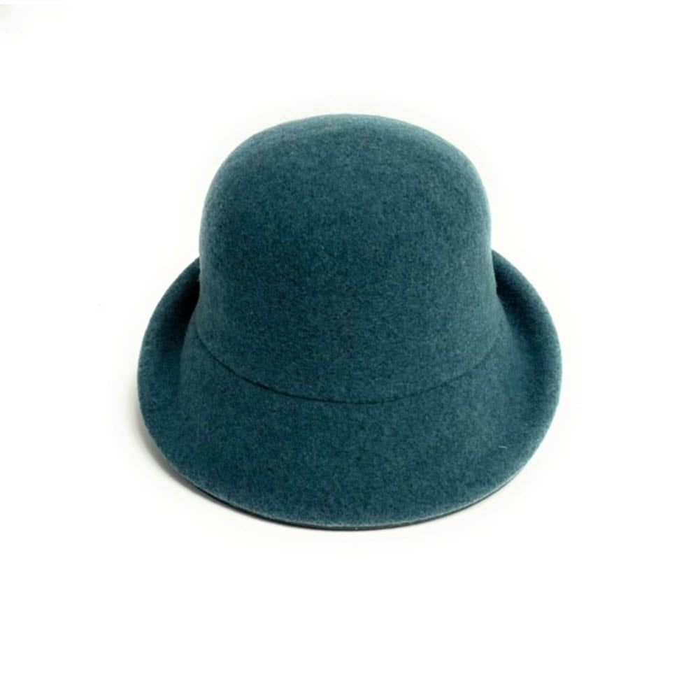 A teal, felt cloche hat with a rounded crown and a short, soft brim, featuring an adjustable band for a perfect fit is the SHIHREEN WOOL TURN BRIM TEAL by Shihreen Inc.