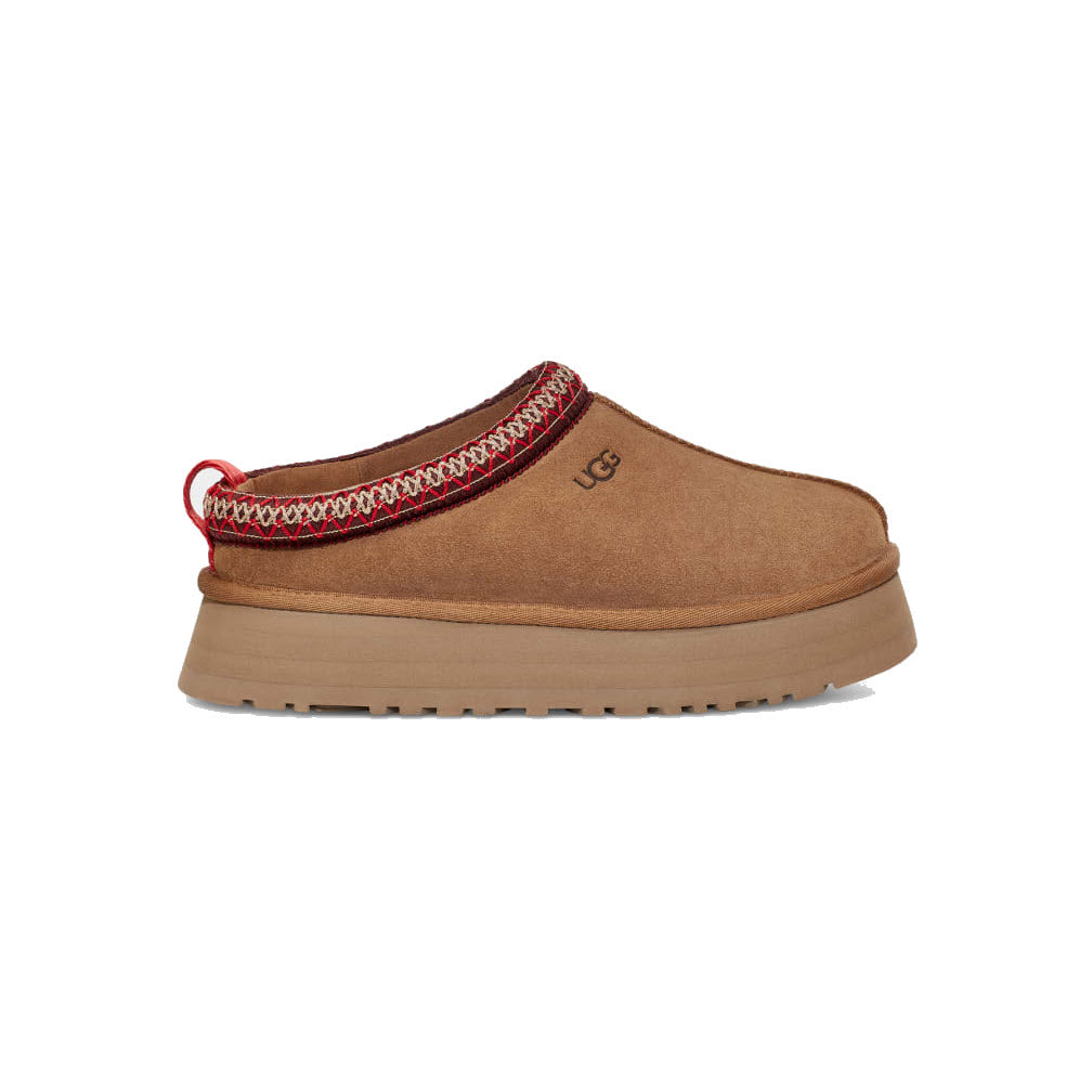 Side view of a single Ugg UGG TAZZ CHESTNUT - WOMENS with rich suede, a patterned trim, and a thick beige platform sole featuring UGGplush™ wool blend.