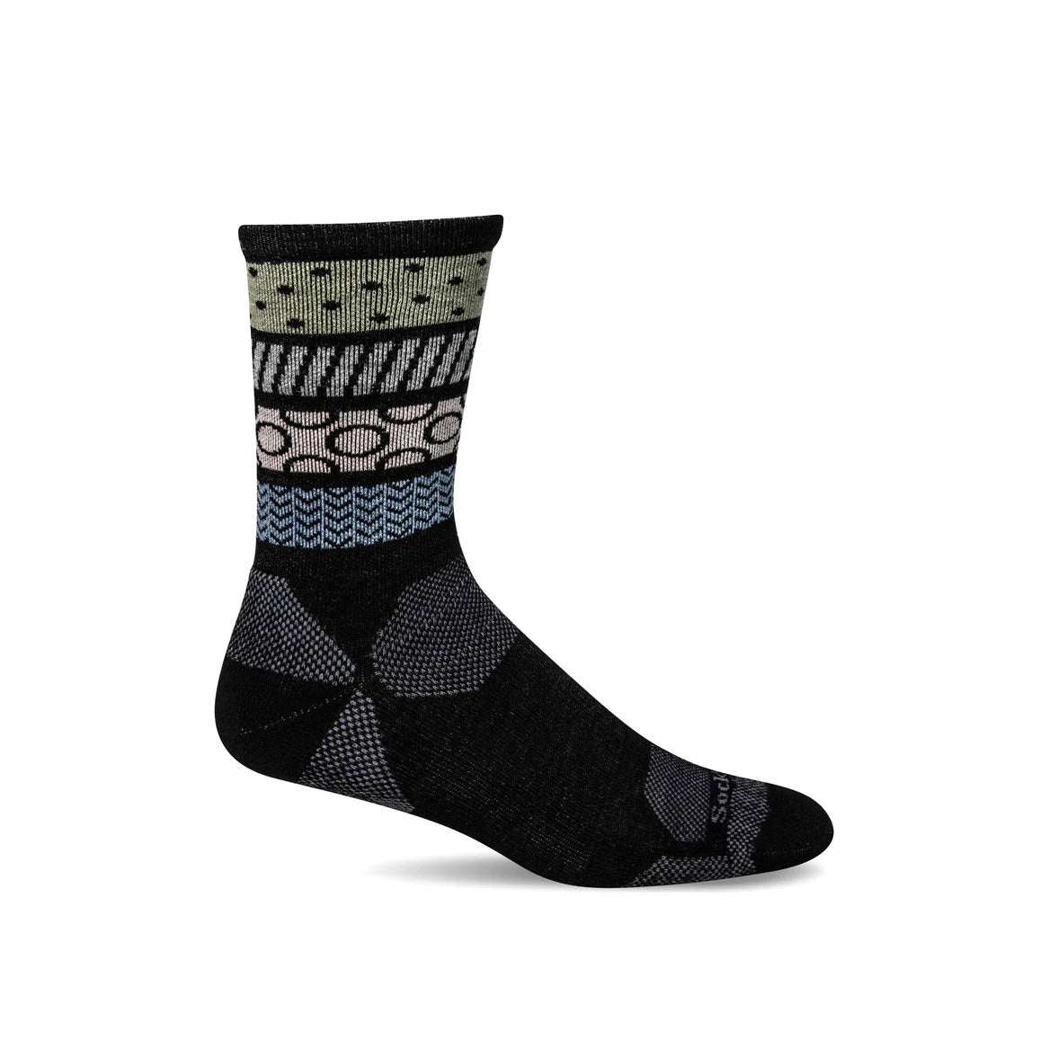 A black **SOCKWELL RYTHM 15-20 MMHG COMPRESSION CREW SOCKS BLACK - WOMENS** featuring a mix of green, white, and blue geometric patterns near the top and various textures and designs along the foot and ankle, crafted from soft merino wool for outdoor adventures.