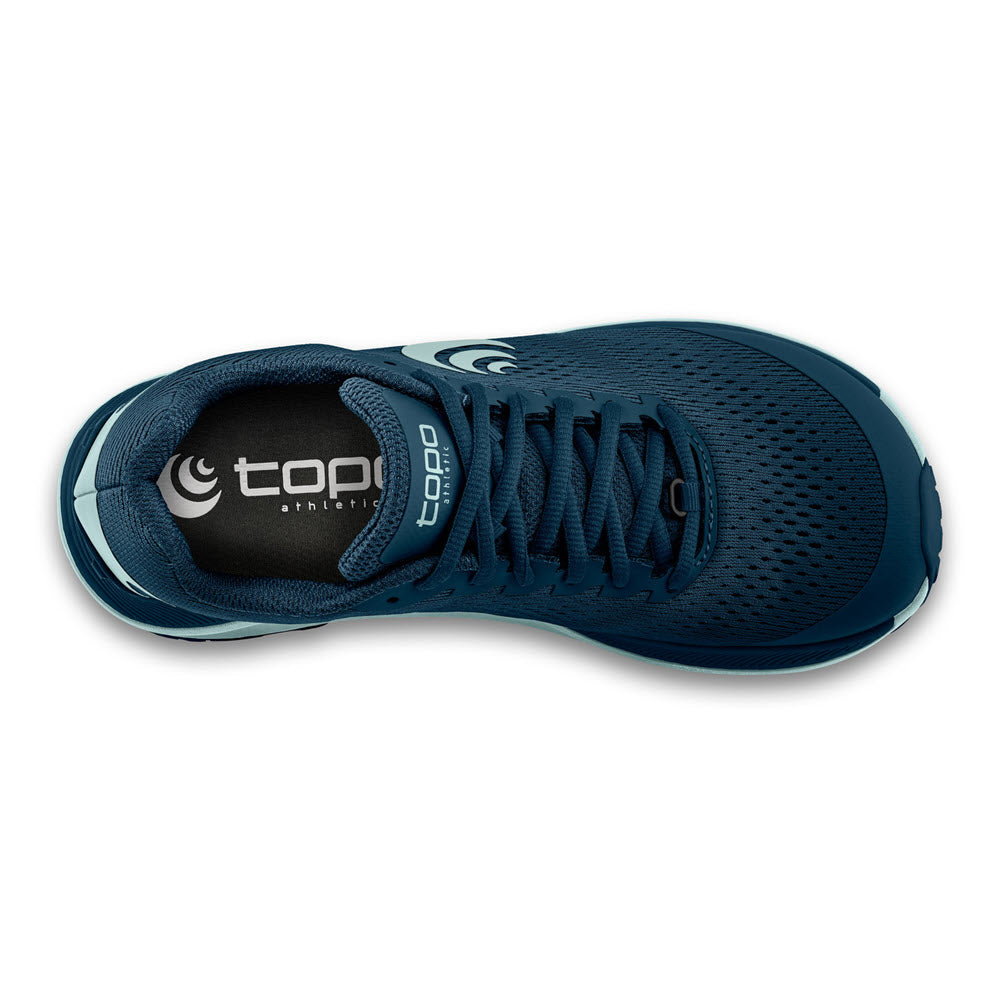 Top view of a single navy and blue women&#39;s athletic shoe from the TOPO ULTRAVENTURE 3 collection, with the brand name &quot;TOPO&quot; visible on the insole and featuring a cushioned platform for enhanced comfort.