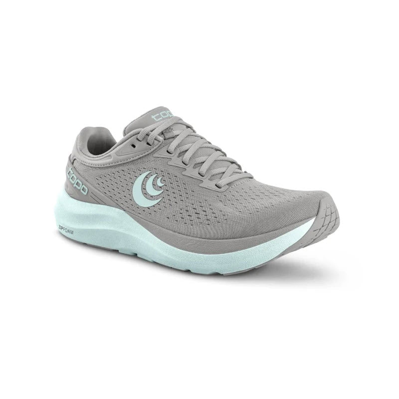 A gray running shoe with light blue accents, the TOPO PHANTOM 3 GREY/STONE - WOMENS by Topo Designs features a lace-up design, breathable mesh upper, cushioned midsole for excellent daily trainer comfort, and a durable rubber outsole.