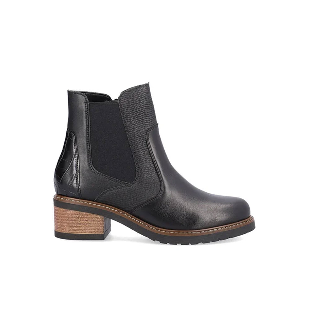 The REMONTE MIXED MEDIA CHELSEA BOOTIE BLACK for women by Remonte features black leather construction with a low stacked heel, elastic side panels, and a textured leather back detail.