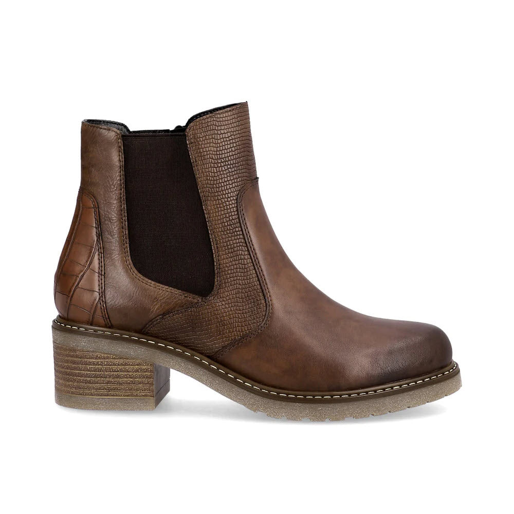 The Remonte Mixed Media Chelsea Bootie in Cognac for women features a brown leather upper, textured panel, side zipper, chunky heel, and an elastic side inset.