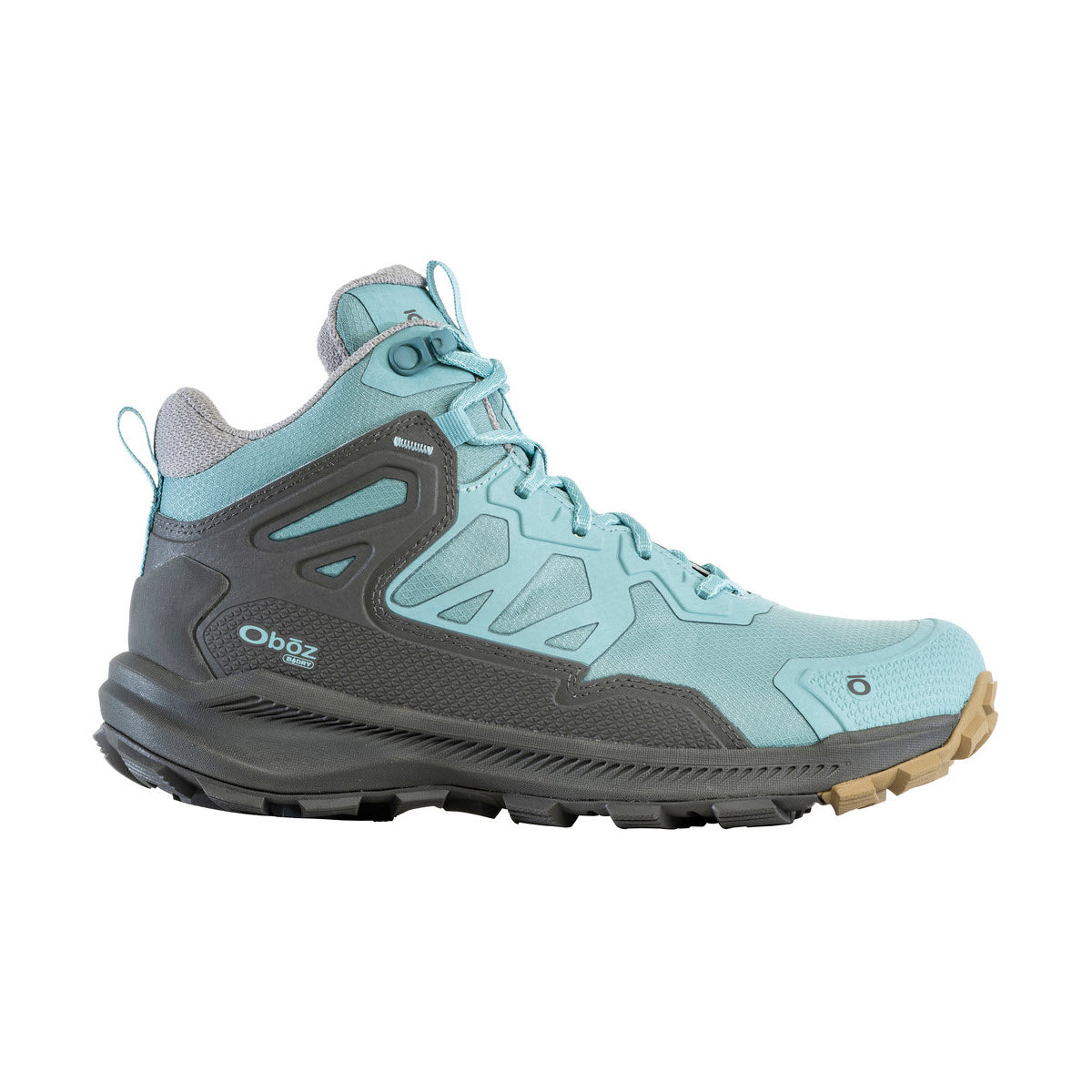 Introducing the OBOZ KATABATIC MID B-DRY ISLAND for Women: This light blue hiking boot, featuring a durable grey sole and the Oboz brand name, offers a rugged and waterproof design perfect for challenging outdoor terrain. Experience ultimate comfort and durability on any adventure with this supportive hiking shoe.