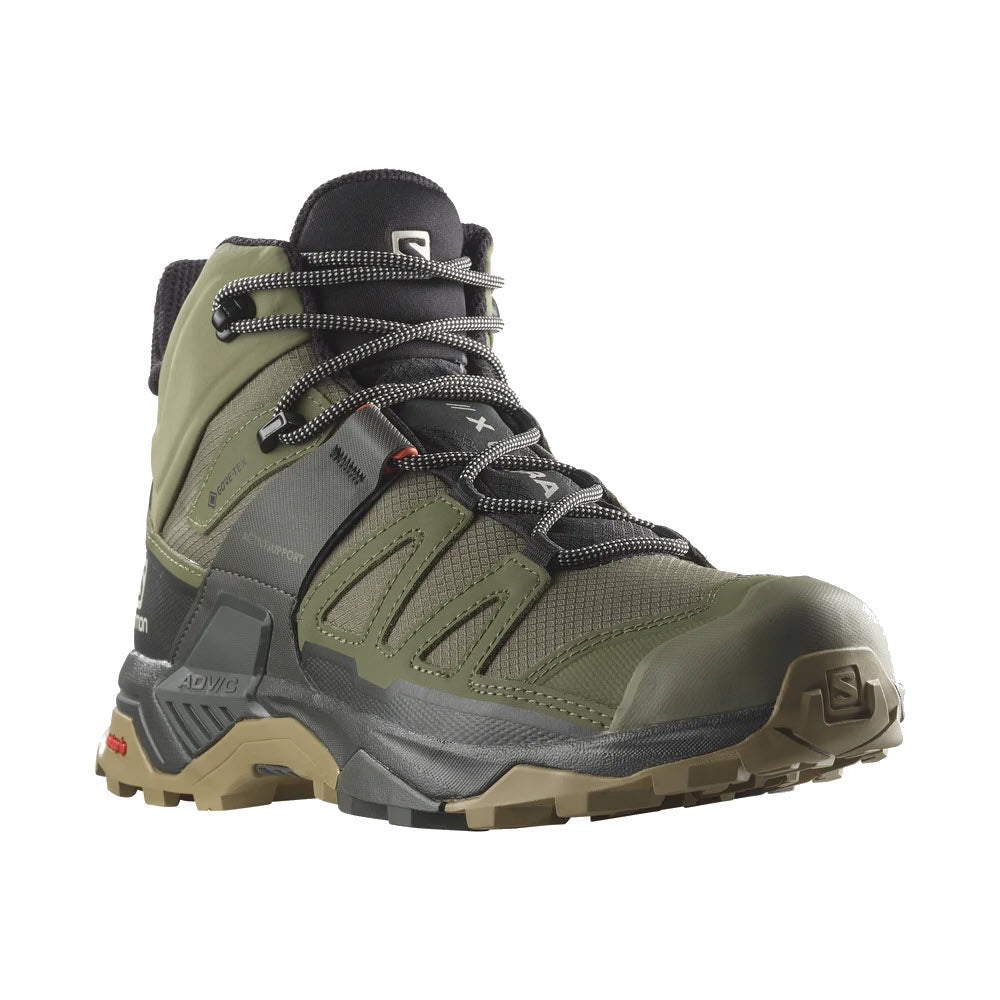 A rugged, green hiking boot with black laces, featuring a thick, multi-textured sole designed for technical terrain and outdoor activities - the Salomon SALOMON X ULTRA 4 MID GTX LICHEN GREEN/PEAT/KELP - MENS.