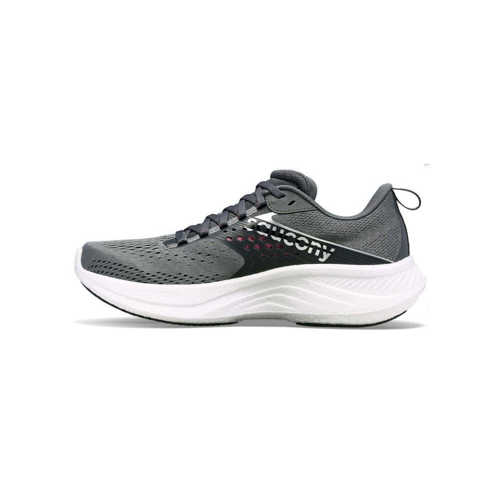 A gray athletic shoe with a white sole, black laces, and a brand logo on the side. Featuring an engineered mesh upper and PWRRUN+ foam for added comfort, this Saucony SAUCONY RIDE 17 CINDER/ORCHID - WOMENS performance running shoe also includes perforated detail and a loop at the back.