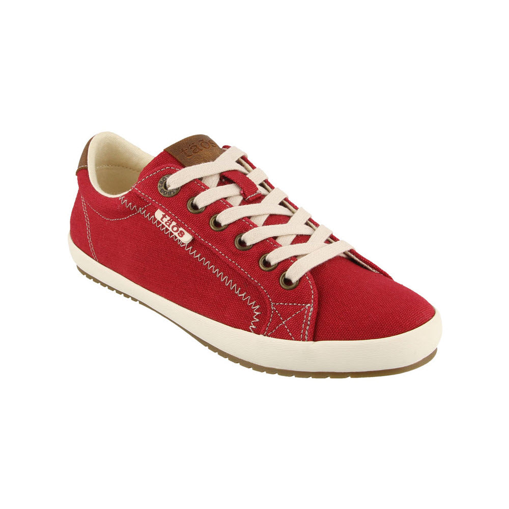 Introducing the TAOS STAR BURST RED - WOMENS by Taos: a striking red sneaker featuring white laces, a white sole, silver eyelets, visible stitching, a brand logo on the side, and fabricated leather trim for a custom fit.