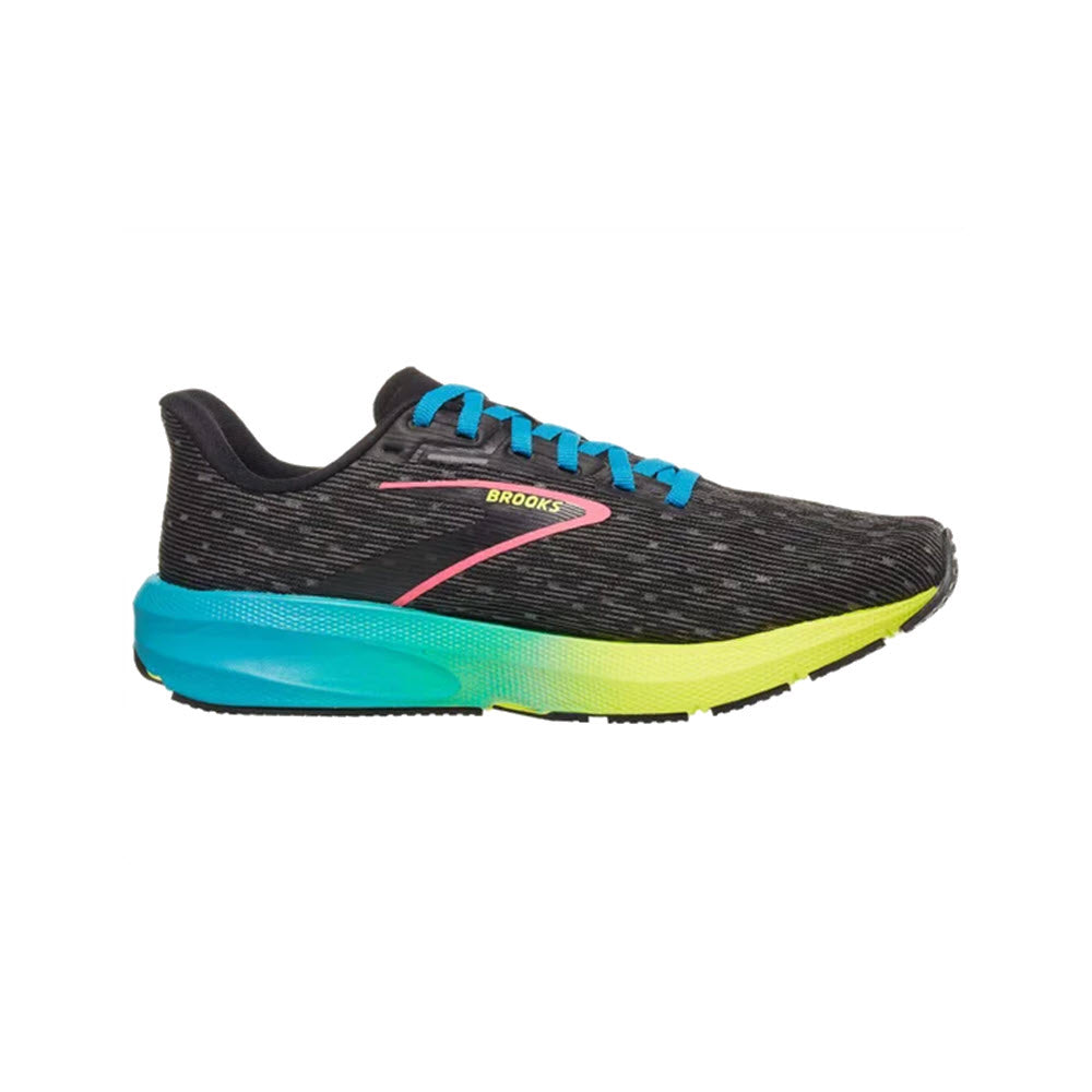 A black running shoe featuring blue laces, neon green, blue, and yellow accents with the brand name "Brooks" in yellow on the side. The BROOKS LAUNCH 10 BLACK/NIGHTLIFE/BLUE - WOMENS is a versatile workout shoe designed for those seeking both style and performance.