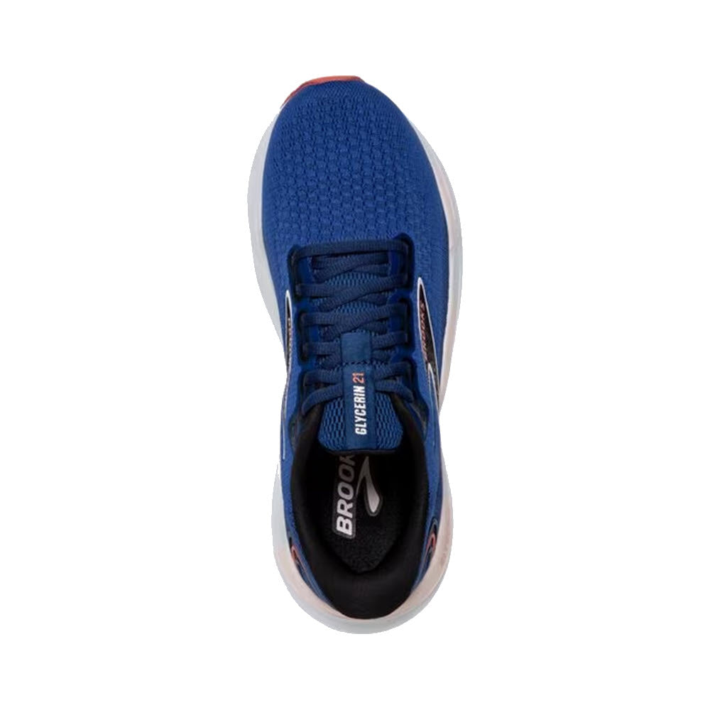 Top view of a blue athletic women&#39;s running shoe with white and red accents, labeled &quot;BROOKS GLYCERIN 21 BLUE/ICY PINK/ROSE - WOMENS&quot; on the tongue, and &quot;Brooks&quot; branding on the side, featuring DNA LOFT cushioning for a plush ride.