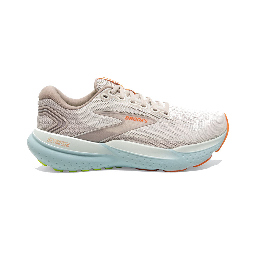 Side view of a light grey and beige women&#39;s running shoe, featuring an orange logo and detailing, with DNA LOFT v3 cushioning for comfort. The cushioned sole and green rubber grip at the bottom complete this stylish BROOKS GLYCERIN 21 COCONUT/AQUA/AUTUMN SUNSET - WOMENS design.