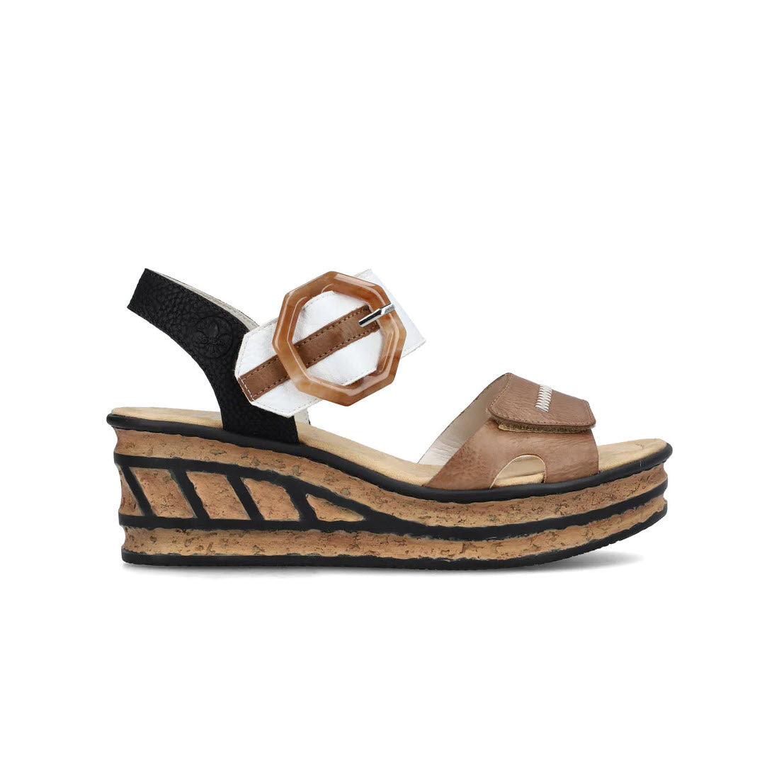 The RIEKER BIG BUCKLE WEDGE TAN MULTI - WOMENS, crafted by Rieker, is a chic pair of platform wedge sandals featuring a cork sole and black, white, and brown leather straps. This stylish design is secured with a large brown buckle and perfect for any occasion.