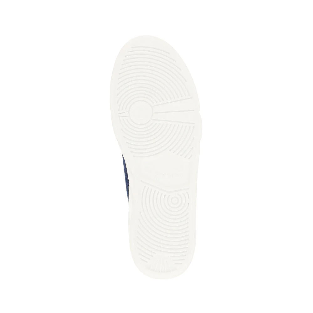 The image showcases the sole of a white Revolution sneaker, specifically the REVOLUTION PLATFORM STREET SNEAKER JEANS - WOMENS, featuring circular tread patterns on the bottom.