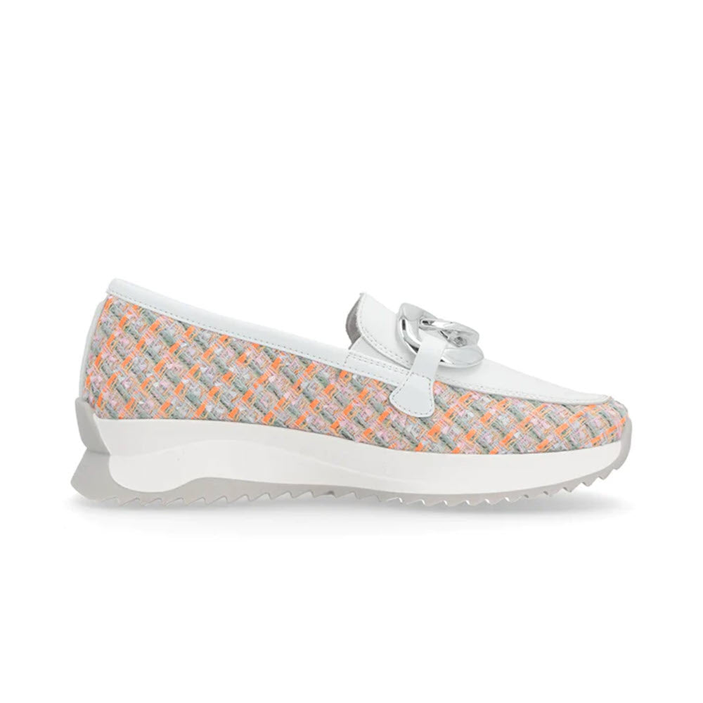 A side view of the trendy Revolution Sneaker Loafer Plaid Tweed Mauve for women, featuring a multicolored woven pattern with white accents, a metal buckle detail on top, and a thick, white, jagged sole.