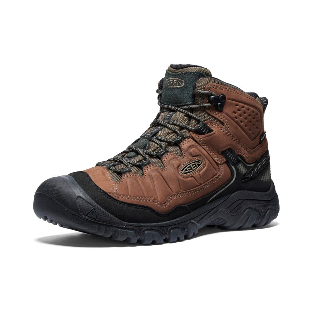 A KEEN TARGHEE IV MID WATERPROOF BISON/BLACK - MENS with a rugged sole, lace-up design, ankle support, and glue-free construction.