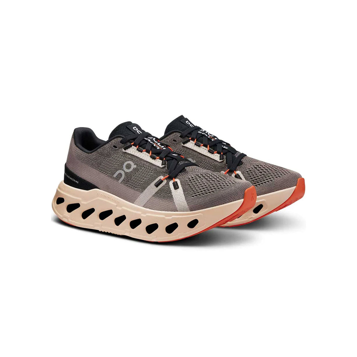 Introducing the ON CLOUDECLIPSE FADE/SAND - WOMENS by On Running: a stylish pair of running shoes in gray and tan, accented with black laces and orange highlights. These shoes feature a perforated thick sole crafted from Zero-Gravity foam for ultimate comfort and performance.