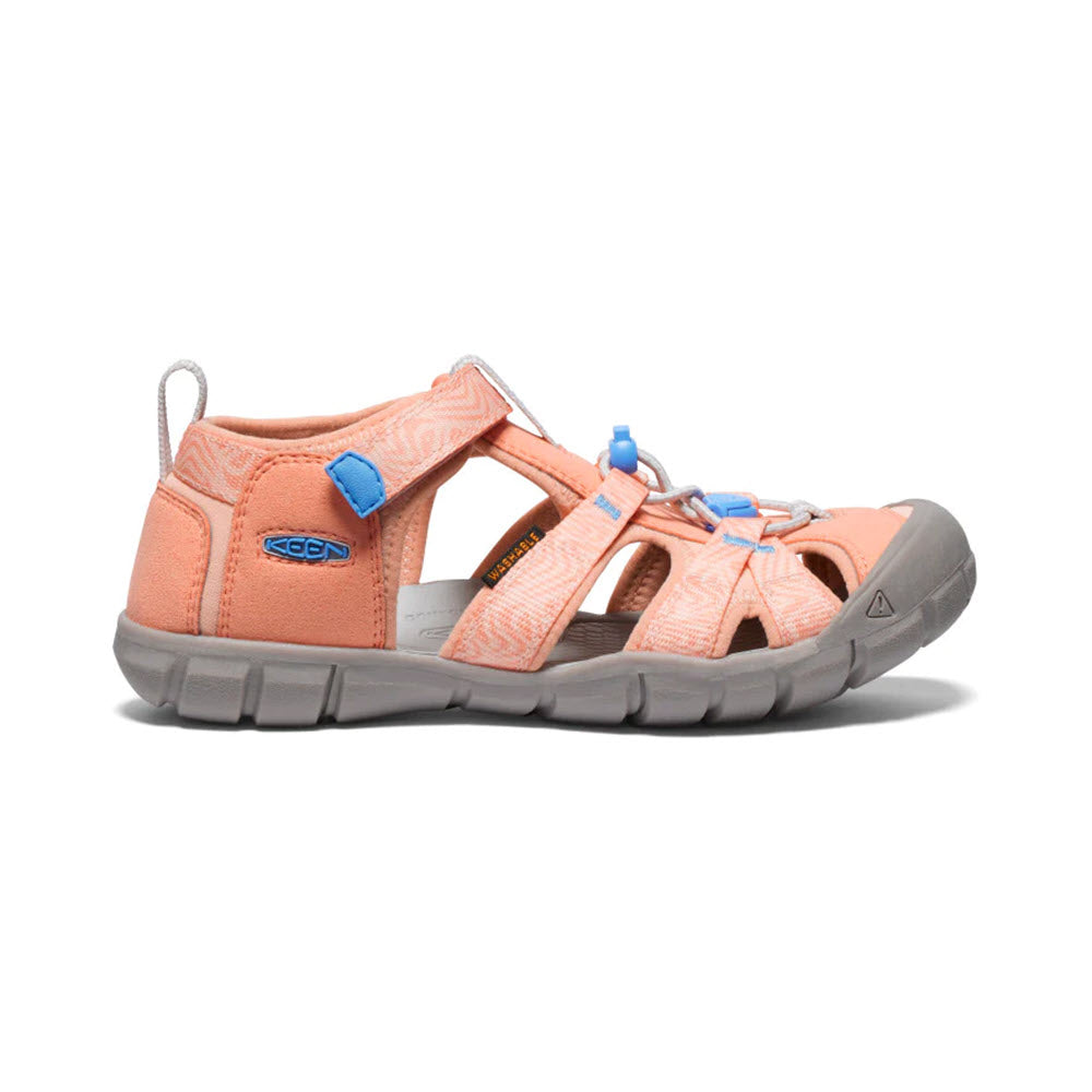 Side view of an orange Keen KEEN SEACAMP II CNX CHILD PAPAYA PUNCH - KIDS with a grey sole, closed toe, and multiple straps with blue details.