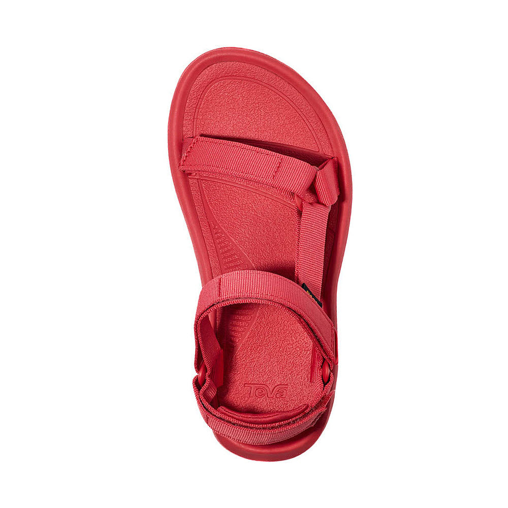 Top view of a single red TEVA HURRICANE XLT2 TOMATO PUREE - WOMEN sandal with adjustable straps, a flat sole, and REPREVE polyester webbing for an earth-friendly choice by Teva.